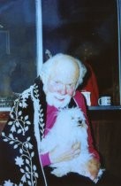 Roger Somers holding dog, late 1990s