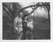 Mom and Dad with baby, unknown