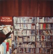 Overcrowded bookshelves, 1984