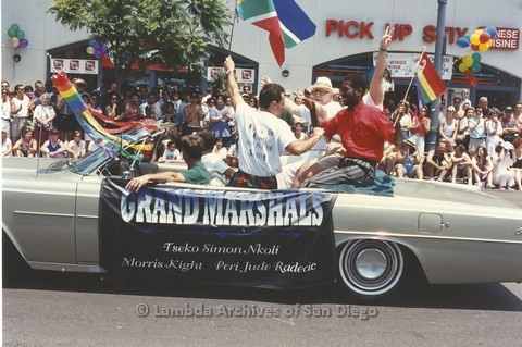 1994 - San Diego LGBT Pride Parade: Contingent - Grand Marshalls, Morris Kight (back seat left, white hat) and Peri Jude Radecic (center) and Tseko Simon Nkoli (back seat right)