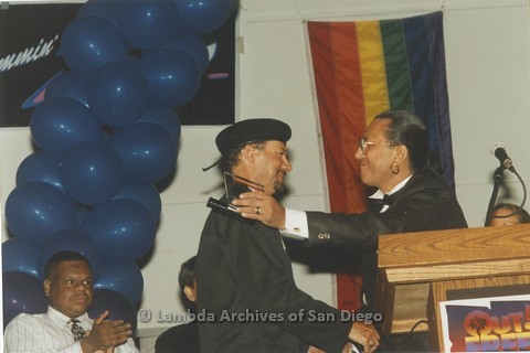 1995 - San Diego LGBT Pride Rally: 'Out And Free' Pride Awards: Award Recipient, San Diego LGBT Performer and Artist Kenny Ard (center) with LGBT Pride Board Co-Chair Larry Baza (right)