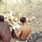 Photograph by Gustafsson of Fellow Soldiers Sitting in A Bomb Crater