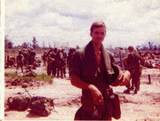 Photograph of Gustafsson With Fellow Soldiers in the Background in Vietnam