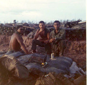 Photograph by Gustafsson of Fellow Soldiers Sitting and Eating in Camp