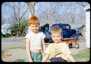 Three Little Boys With Their Wagon