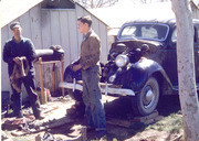 Backyard Mechanics, Linnell Farm Labor Camp, Tulare County, Calif