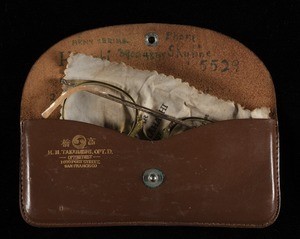 Eyeglasses, case, and cleaning cloth, 1940/1945