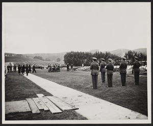 Walking Hiroshi Sugiyama's casket to gravesite, 1948-12-15