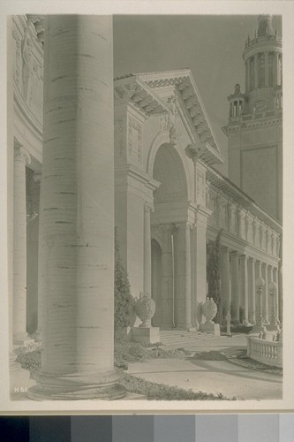 H61. [Western entrance to Palace of Liberal Arts; Italian Tower in distance. From Court of Palms (George W. Kelham, architect).]