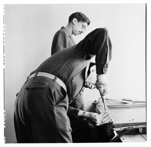 Soldiers working in the Camp Kaiser Art and Craft Shop, Korea