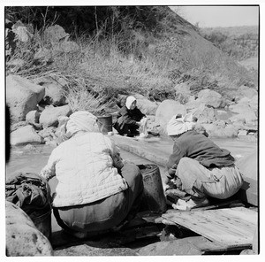 Women washing laundry in a stream, Korea