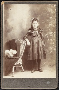 A cabinet studio portrait of a Latino girl, circa 1890s