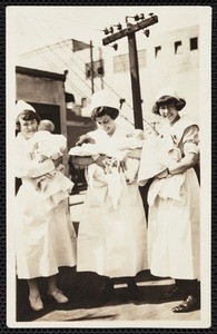 Three nurses with babies, photograph, 1923