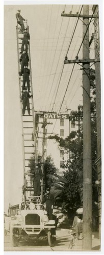 Fire fighters on ladder truck, Engine Co. No. 28, Los Angeles