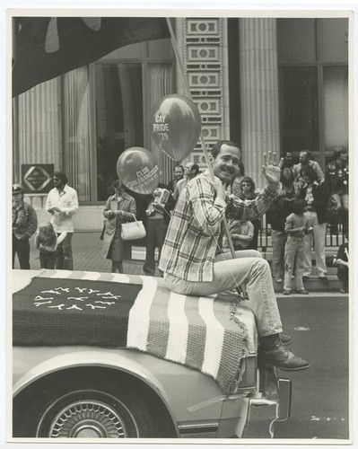 Leonard Matlovich seated on Lambda American flag