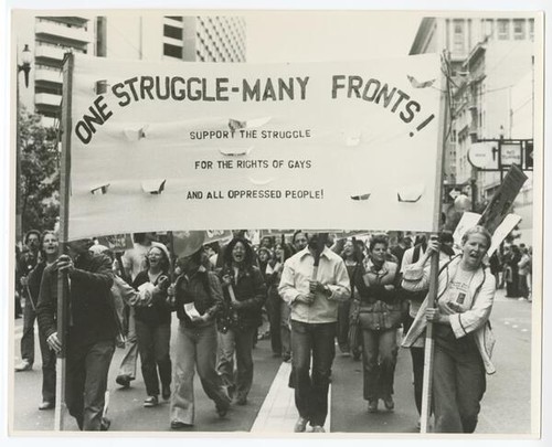 Banner reads: "One Struggle - Many Fronts! Support the Struggle for the Rights of Gays and all Oppressed People!"