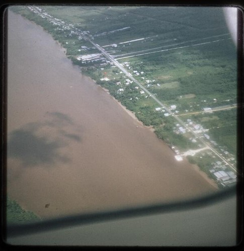 Aerial view of buildings and river