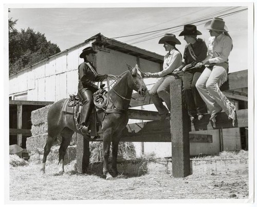 Horsewomen at the stables