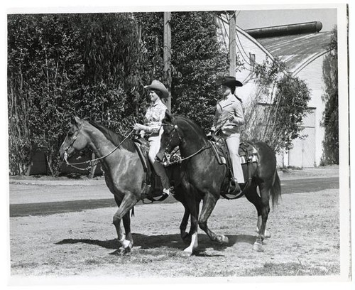 Princess Linda Suda of Sacramento riding Taylor King and Queen of Show Patty Burner of Tulare riding Evil Keno