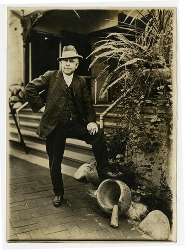 Reginaldo F. del Valle posing with mortar and pestle