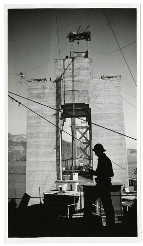 Golden Gate Bridge construction, silhouette of worker