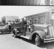 Fire Fighters and Children on Fire Truck, 1959