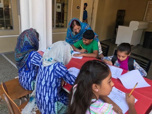 Pushpinder Kaur Teaching at San Jose Khalsa School with Blue Scarf