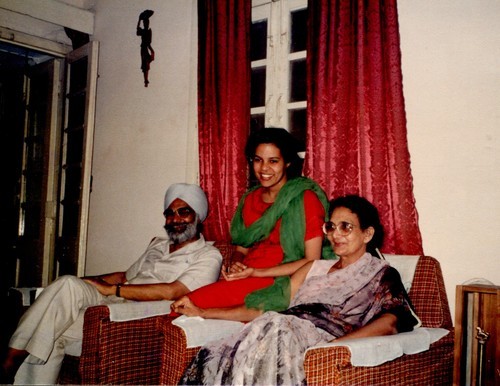 Narinder and Savitri Randhawa with a younger person in their Delhi home