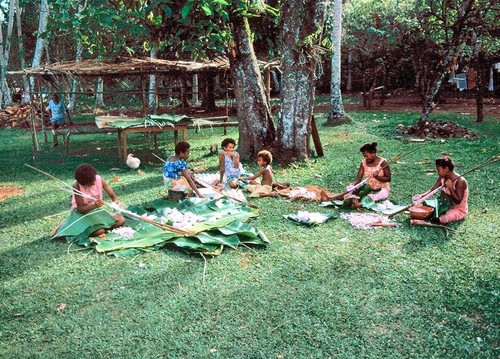 Women Grating Taro