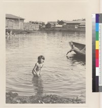 Photo 9:Children bathing in a pond