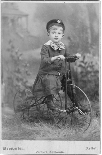 Boy on Tricycle