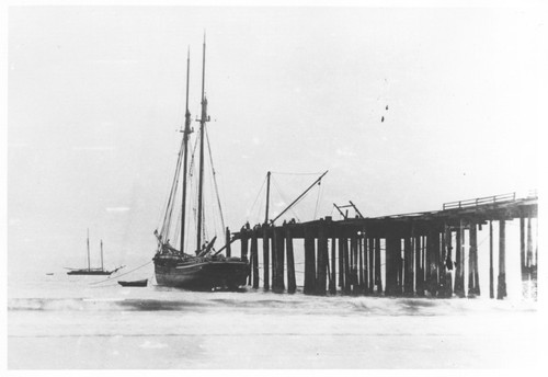 Schooner Tied Up at Wharf