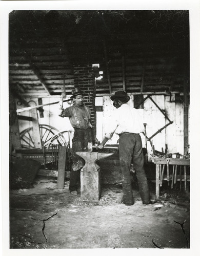 Two Blacksmiths Working