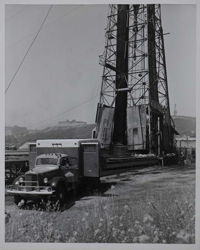 Truck and Oil Well