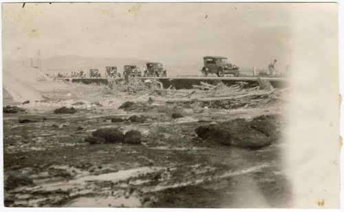 Cars Driving By Saint Francis Dam Debris, Santa Paula