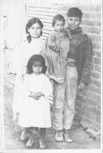 Trinidad and Adela Ordoñez With Two Children