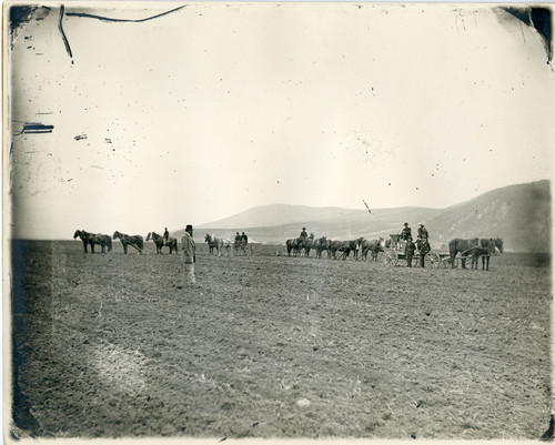 Farm Scene - Horses, Equipment, and Men