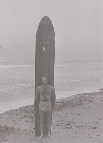 John Larronde with Surfboard