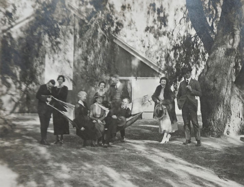 Daily Family Outside Barn and Sitting on Hammock