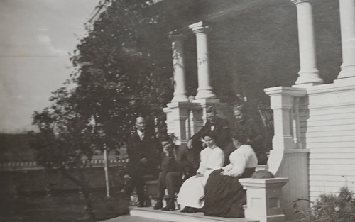 E.W. Daily Family Sitting on Porch Steps at Home