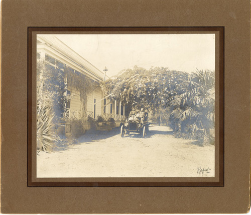 Claire Ramsey in Car in Front of the Ramsey House