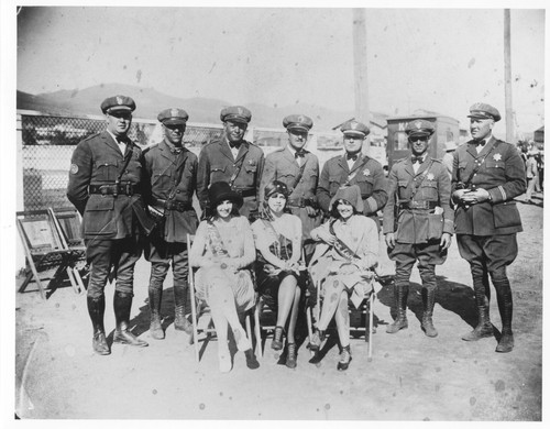 Highway Patrolmen with Three Women