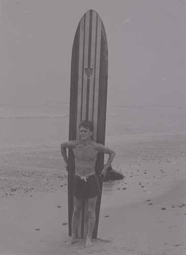 Ray Bergstrom and Surfboard — Calisphere