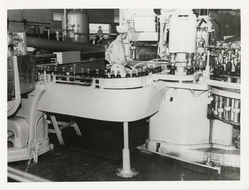 Worker and Machinery, Coca-Cola Bottling Company
