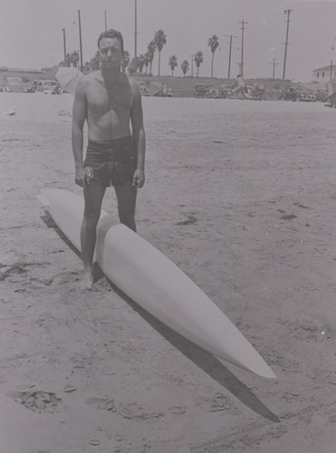 George Weston with Surfboard