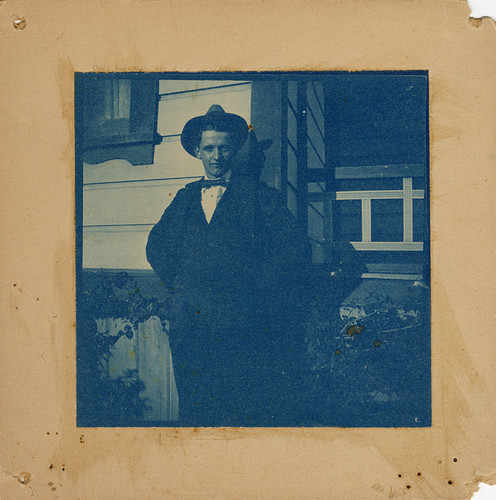 Young Man in Suit and Bowtie