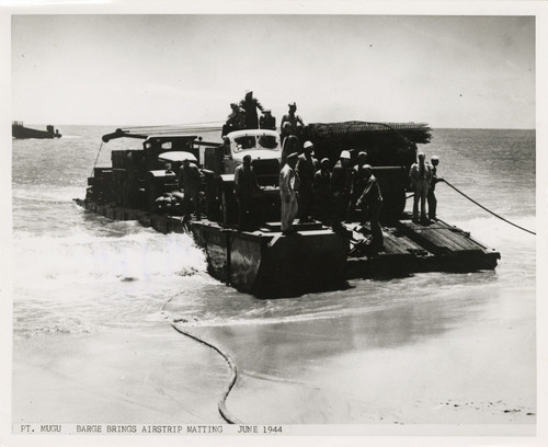 Barge Transporting Airstrip Matting