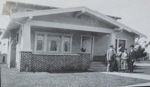 Group Photo in Front of Home