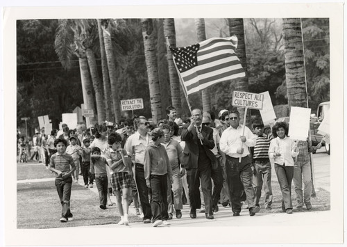 Joe Mendoza Leading March Protesting "English Only" Ordinance