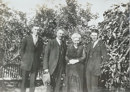 Outdoor Portrait of Three Men and One Woman